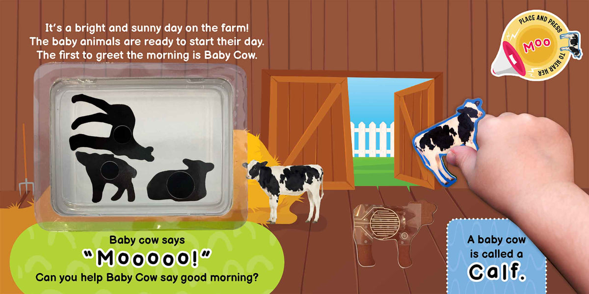 A children's educational toy scene showing a cow-shaped sound/light-up piece being held by a human hand, with a barn illustration, a cow figure, and text panels on a colorful background.